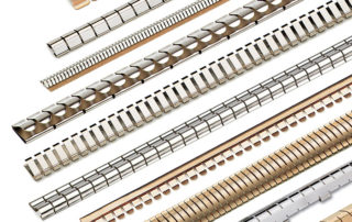EMI/RFI SHIELDING FINGER STOCK GASKETS OFFERED IN MANY MOUNTING OPTIONS AND LENGTHS